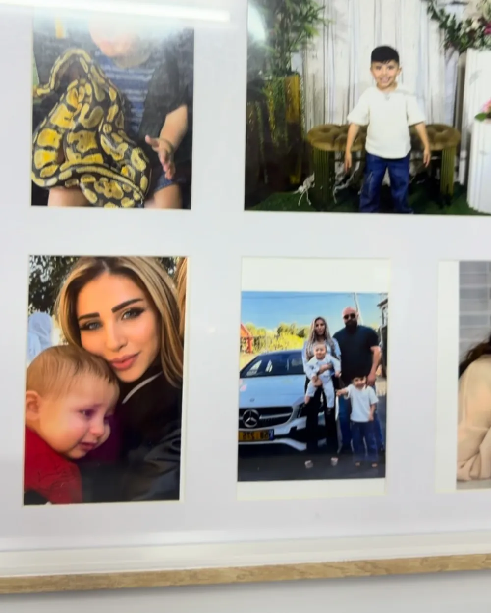 لوحة كبيرة تجمع صور عائلية مطبوعة
